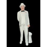 Royal Doulton Sir Winston Churchill figure in white suit with cane and cigar. Modelled by Adrian