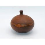 Roger Sloan (1920-2009) – a 1970’s walnut turned small wooden vase with oak root cross-sections by