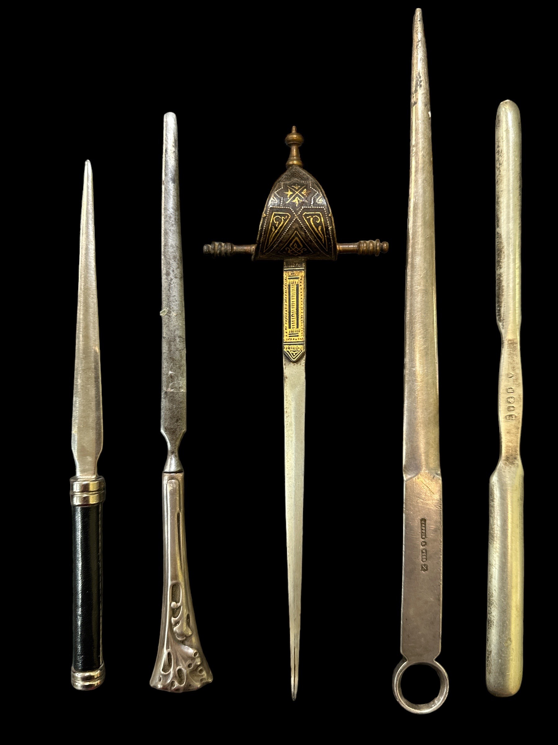 4 letter openers including a vintage Spanish Toledo sword handle letter opener, a Mappin & Webb