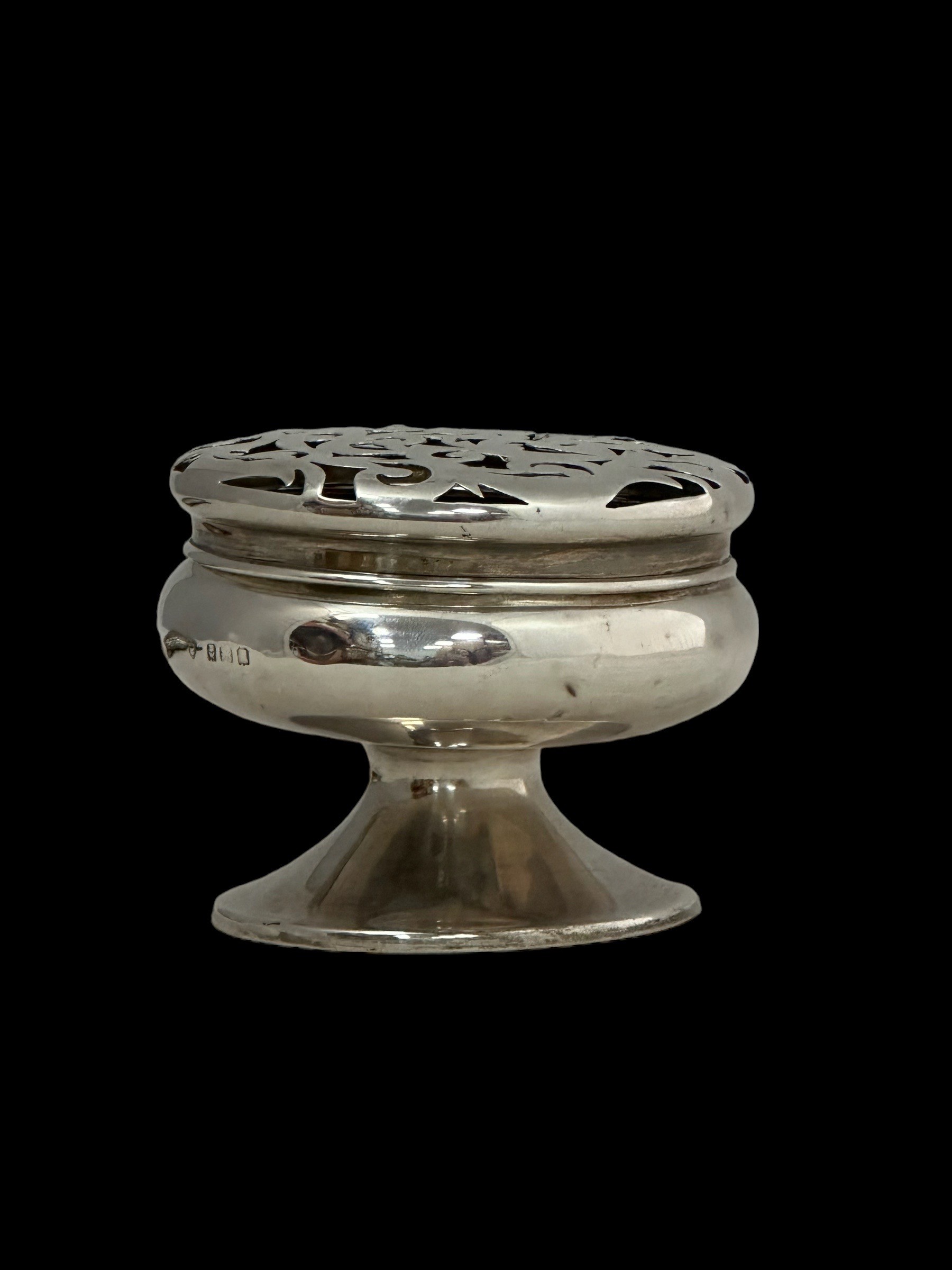 An Edwardian silver pot pourri holder, Birmingham 1909, minor dents, approx 200g. A small silver - Image 3 of 3