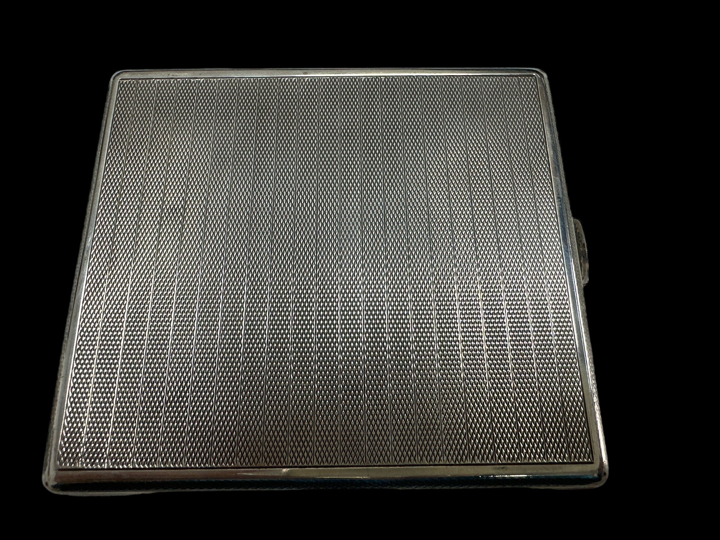 A silver cigarette case with 1931 Birmingham hallmarks. Dimension 83mm x 95mm and weight 130g approx - Image 3 of 3