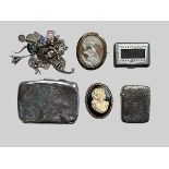 A range of items including a hallmarked silver card case (badly dented), a charm bracelet, 2 cameo