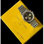 A 1969 Breitling Chronograph Cosmonaute Navitimer Watch, model no. 809. Stainless steel brick link
