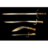 A selection of bladed weapons to include; two bayonets, a Kukri and a further sword. (4)