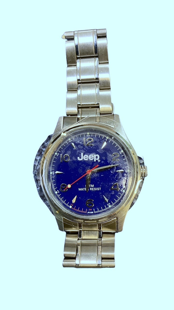 A Jeep blue faced water resistant wristwatch with stainless steel strap. (2006). In Jeep metal tin - Image 2 of 3