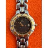 A Fendi watch, with quartz movement, Roman numeral hour markers on bezel and date display. Water