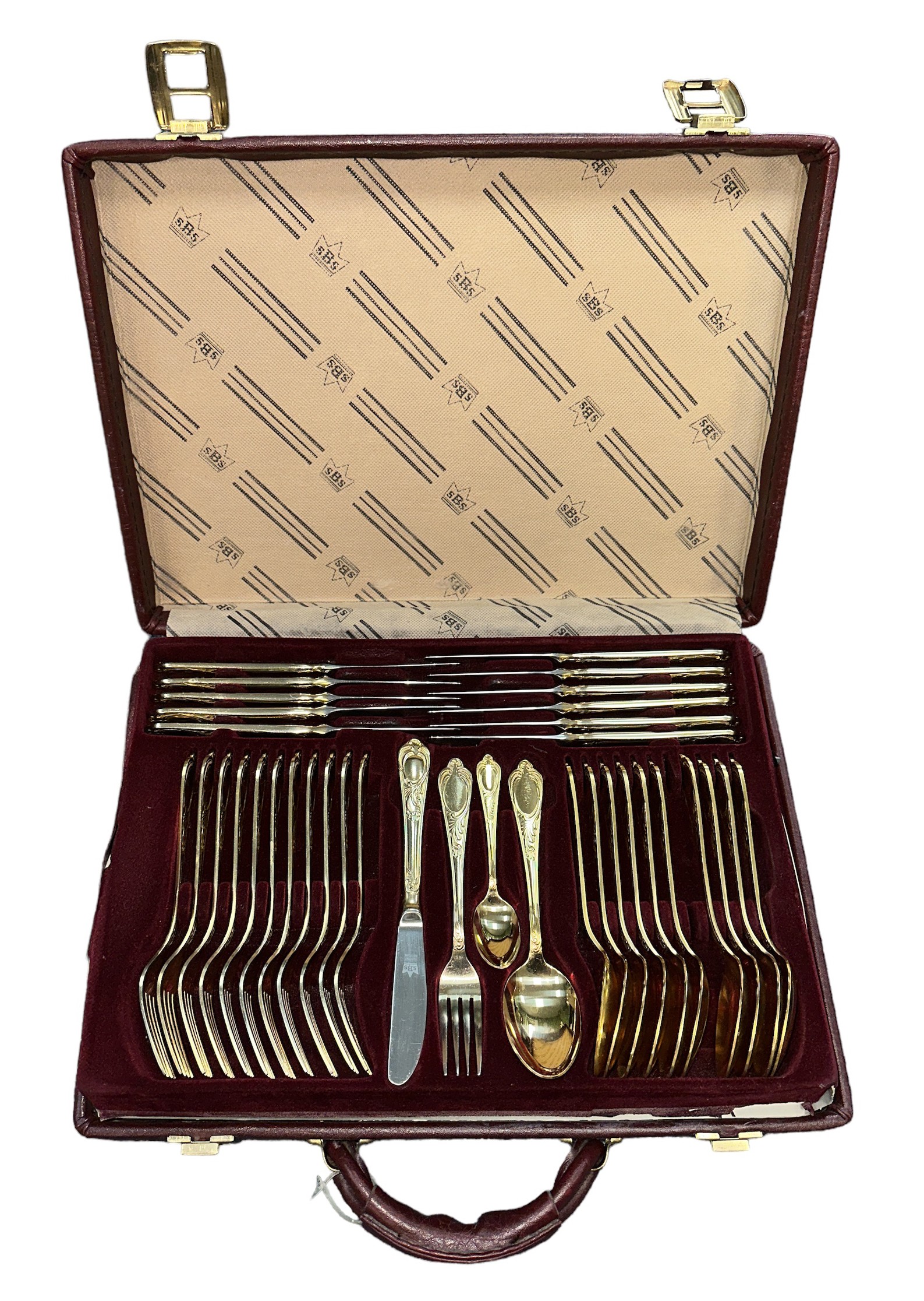 BESTECKE SOLINGEN; a seventy-piece gold plated cutlery set in a leather-style briefcase, over two