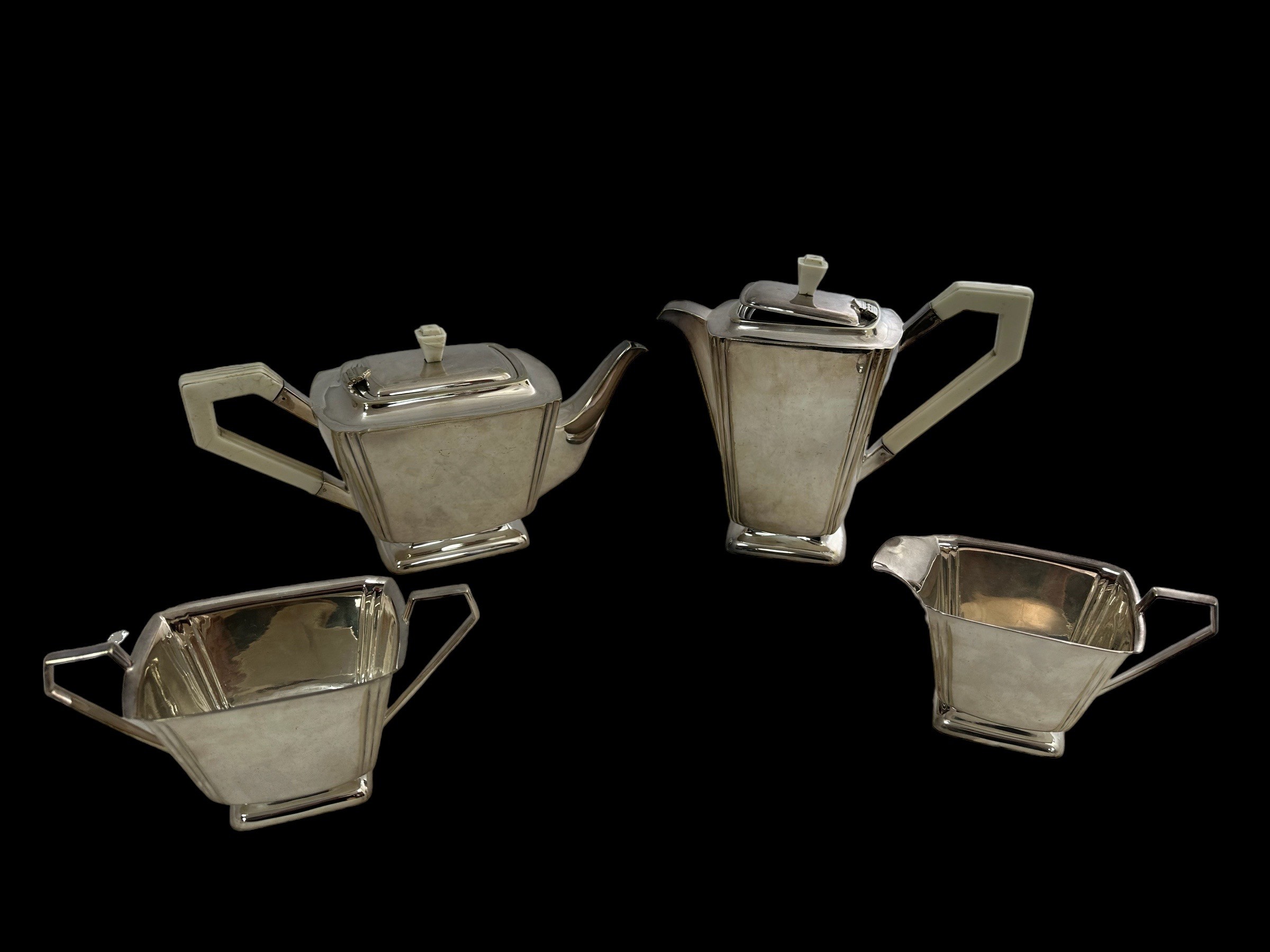 A silver plated Art Deco style four piece tea and coffee service with stylised design. Comprising of - Image 2 of 3