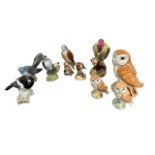 Beswick, Bird group of figurines to include; Beswick Woodpecker (1218), Beswick Kestrel (2316),
