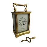 A brass Mappin & Webb carriage clock,15cm high. Clock is running at time of cataloguing.