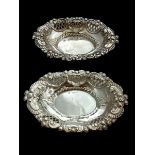 Two bon bon dishes with a filigree design, by Nathan and Hayes, 1898 Chester hallmarks. Weight 67g.