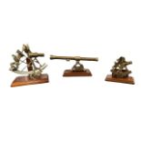 Scientific Instruments 20th Century brass range with sextant (19cm tall) mounted on wooden plinth,
