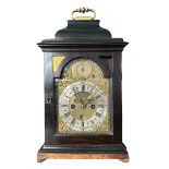 18th Century ebony veneered bracket clock. The arched brass dial with 'Strike/Silent' dial to the