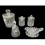 A cut glass biscuit barrel approx 17cm high along with two cut glass jam pots, a crystal bell and