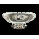 A silver Barker Ellis oval comport with foliate design border and an oval stepped foot. 1989