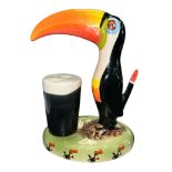 Carlton Ware (later) hand painted ceramic Guinness Toucan lamp base, Toucan stood next to a full