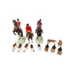 Beswick, a eleven piece Beswick hunt scene comprising of; two reared rider figures on brown horses