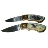 Franklin Mint, a pair of Franklin Mint collectable knives with working dog scenes, pair of black