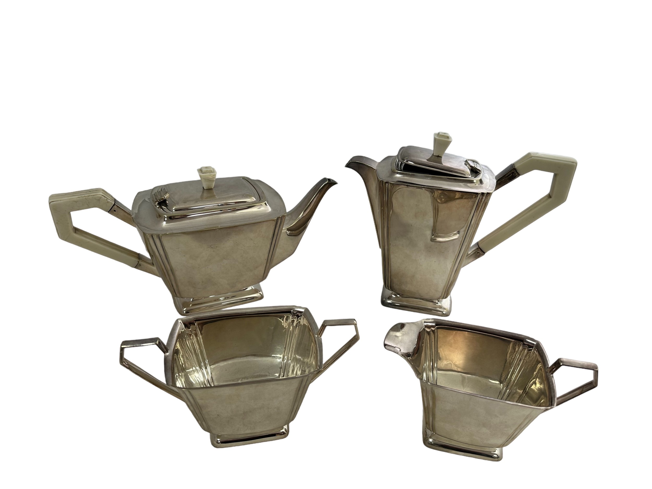 A silver plated Art Deco style four piece tea and coffee service with stylised design. Comprising of - Image 3 of 3