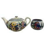 A Poole Pottery teapot and sugar bowl. In good condition.