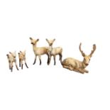 Beswick, family of Deer to include; seated Stag model no. 954, Doe (x2) and Fawn (x2). Total