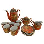 Japanese 'Dragon ware' Tea set comprising of 15 pieces. Teapot, sugar bowl, cream jug, six saucers