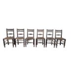 Set of six mid 19th Century rush seated country chairs with matching rocking chair en-suite