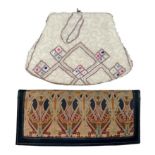 A Liberty ladies wallet / cheque book holder with pen with a clutch bag hand made in Belgium. Qty 2