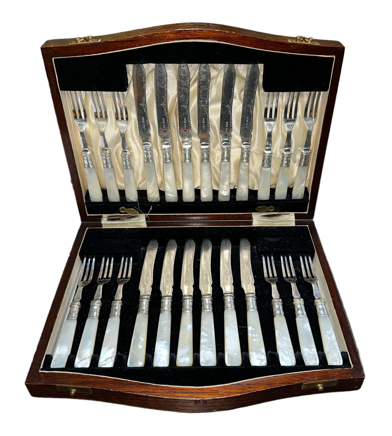 A twenty-four piece Victorian silver plate dessert cutlery set