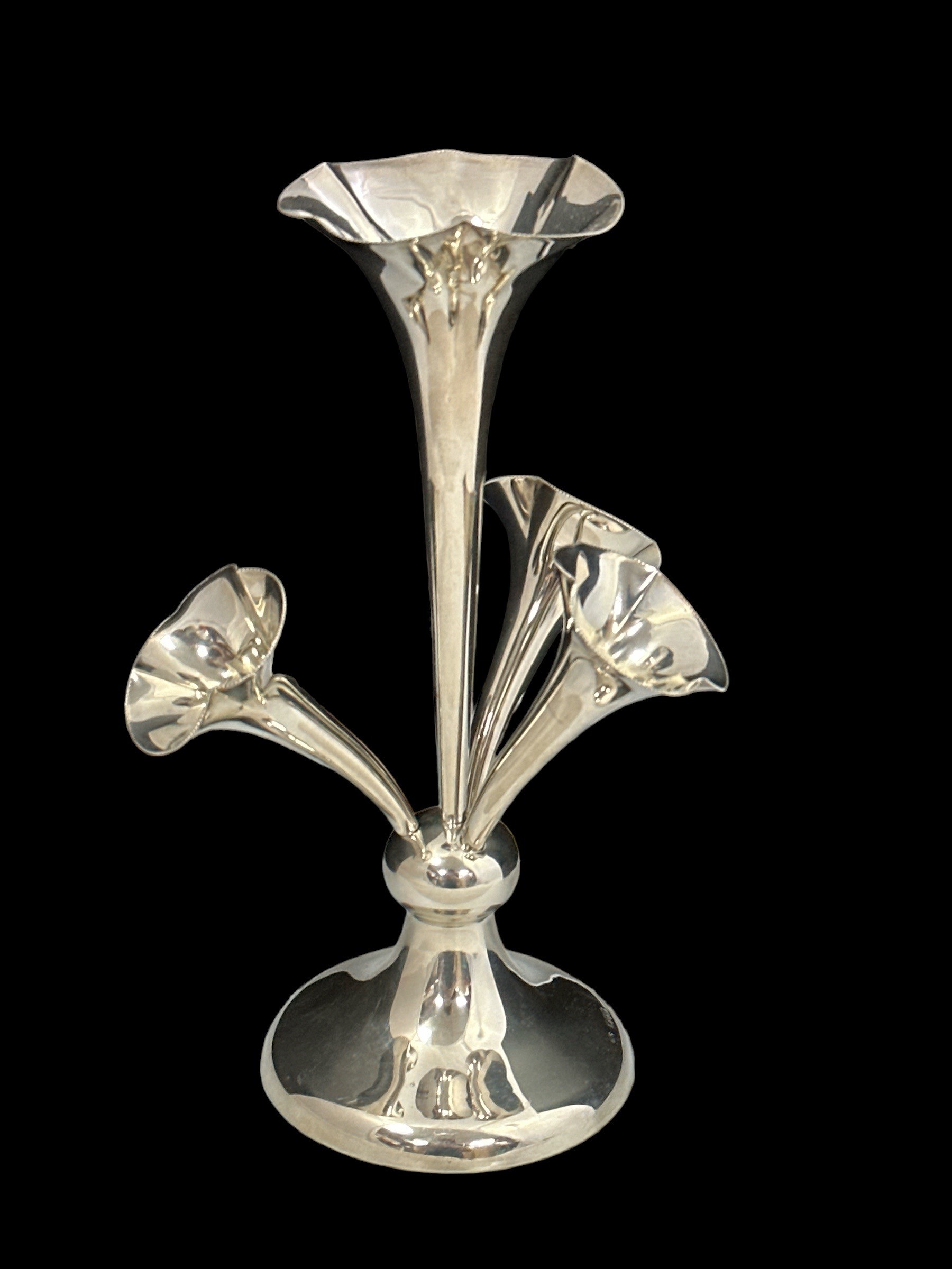 A sterling silver epergne by Jones and Crompton, with plain circular base, one large and 3 smaller