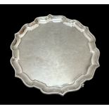 Sterling silver salver with scroll legs and pie crust rim; by Richard Woodman Burbridge for Harrods,