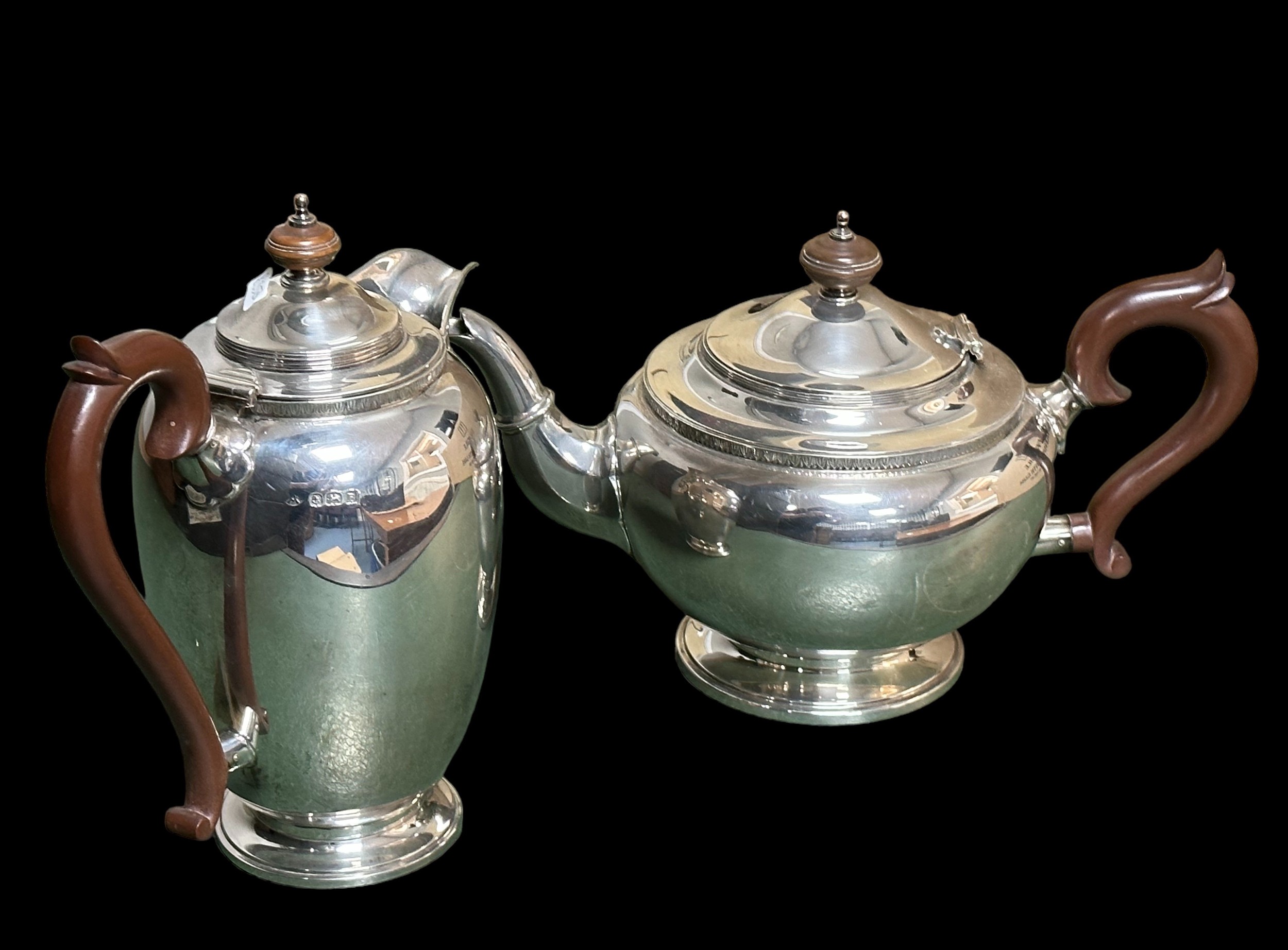 Silver teapot and coffee pot/ hot water pot by Adie Brothers, both with 1926 Birmingham hallmarks.