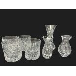 A cased set of four Stuart Crystal tumblers and two Stuart Crystal Cascade flower vases and a