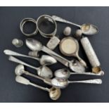 A range of sterling silver items including 2 napkin rings, one dented, 4 thimbles, vanity mirror,