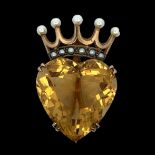 A citrine coronet brooch - a heart shaped citrine surmounted by a coronet set with pearls. Fully