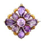A Victorian quatrefoil amethyst brooch, (could be re converted to pendant by attaching a bale to