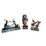 Jim Shore Disney Traditions; a group of three Jim Shore Disney Traditions Enensco figurines to