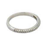 A platinum and diamond half eternity ring, pavé set with three rows of diamonds.