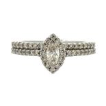 A matching 9ct white gold and diamond engagement and wedding ring in half-eternity style. Engagement
