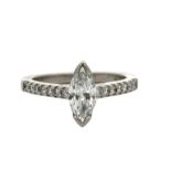 A marquise diamond ring set in platinum with certificate. The marquise diamond is natural, 0.71ct,