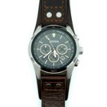 A Gents Fossil Chrono Quartz black dial wristwatch, with brown leather strap, in working order.