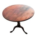 18th Century Cuban mahogany tripod table, measuring 76cm in diameter with height 73cm.