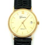 Geneve 9ct gold watch with date aperture, quartz movement, black leather strap, in working order.