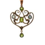 Edwardian art nouveau pendant set with peridot, seed pearls and with two mother of pearl drops. In