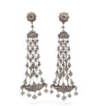 A stunning pair of Art Deco diamond chandelier earrings, mounted in platinum.