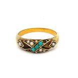 A seed pearl and turquoise ring in 15ct gold. Two turquoise stones missing. London 1894 hallmarks.