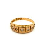 Five diamond gypsy ring in 18ct gold with scroll shoulders. Chester hallmarks but date letter