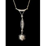 An early 20th Century gold, platinum and old cut diamond daisy necklace. Unmarked gold on pendant is