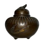 Japanese bronze incense burner, round form decorated to two sides with a crashing wave, lid