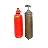 2x Vintage Fire Extinguishers. A red Betterwear manual pump extinguisher. Also a brass Pyrene manual